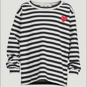 Comme des garçons shirt fits like an M/L